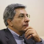 هرامی ارض اقدس، کارشناس اقتصادی